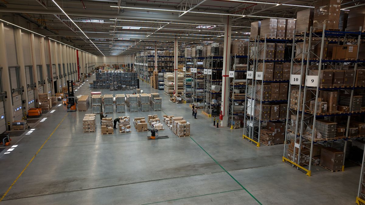 Order fulfilment in progress — picking and packing on the warehouse floor